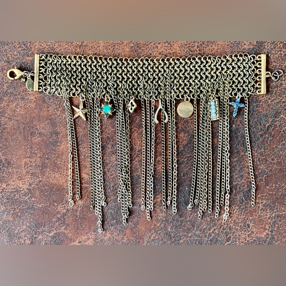 Vintage Gold tone Chain Mail Bracelet with charms and chains.
